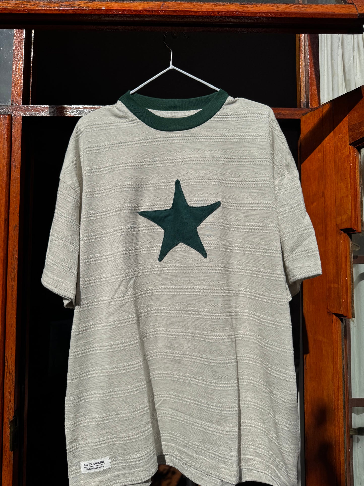 * Green and beige Star tee